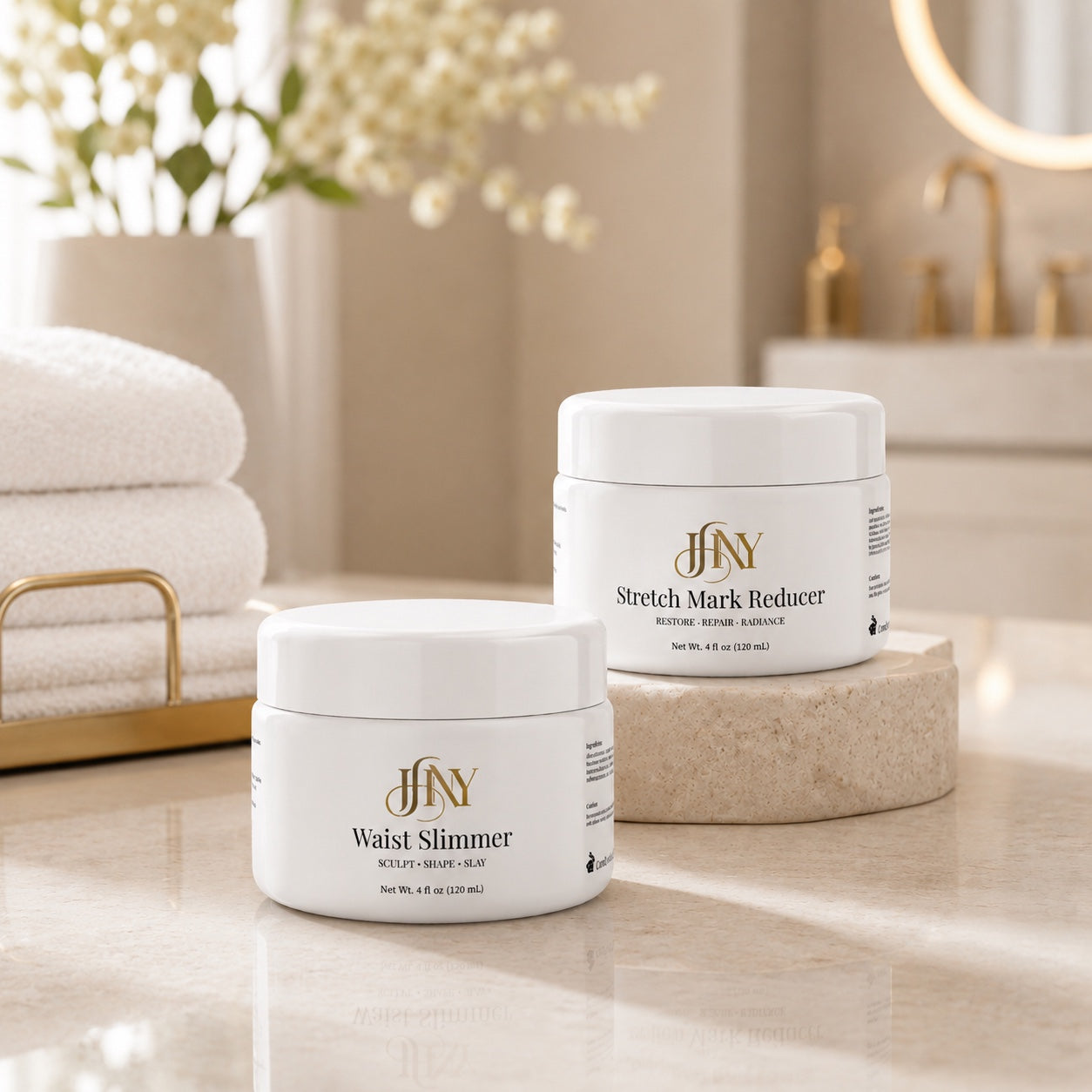 Body by JHNY Define After Dark duo with Waist Slimmer and Stretch Mark Reducer in a warm stone spa setting